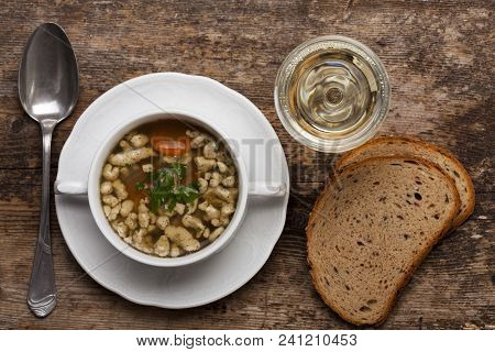 Bavarian Bratnockerl Soup In A Cup With Wine