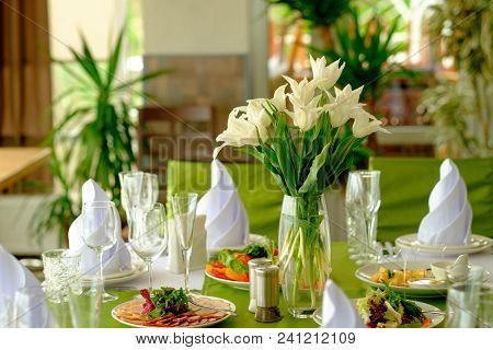 Beautiful Flowers On Table In Wedding Day.