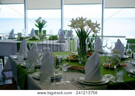 Beautiful Flowers On Table In Wedding Day.