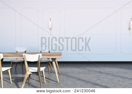 Concrete Floor Dining Room Interior With White Awalls, A Long Wooden Table And White And Wooden Chai