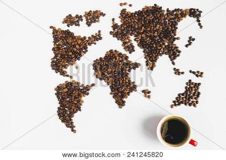 Coffee Cups With Black Coffee And Globe Map Made From Coffee Bean