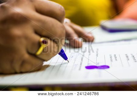 Signing On Important Legal Paper With Thumb Impresion. Shallow Depth Of Field