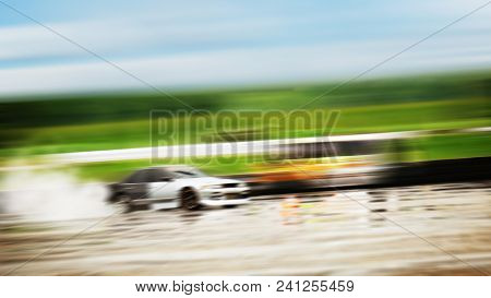 Sport Car Wheel Drifting. Blurred Of Image Diffusion Race Drift Car With Lots Of Smoke From Burning 