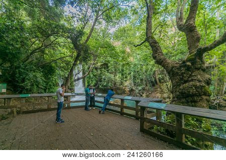Banias, Israel - May 14, 2018: Visitors In The Banias (banyas) Waterfall In The Hermon Stream (bania