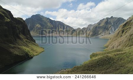 Crater Lake Of The Volcano Pinatubo Among The Mountains, Philippines, Luzon. Aerial View Beautiful L