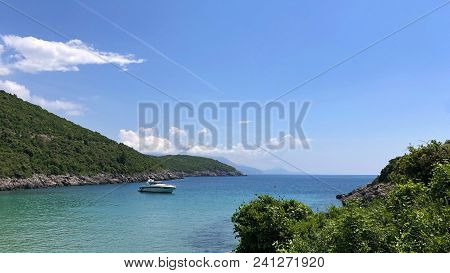 Aerial View Of The Coast Of Montenegro.  Turquoise Sea Water On The Ploce Beach.