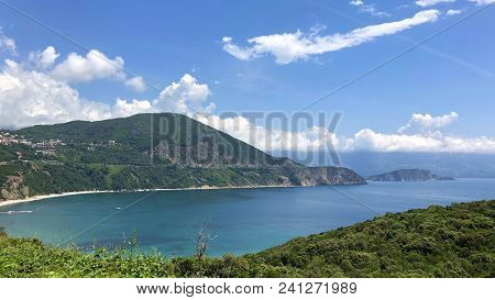 Aerial View Of The Coast Of Montenegro.  Turquoise Sea Water On The Ploce Beach.