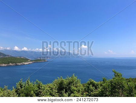 Aerial View Of The Coast Of Montenegro.  Turquoise Sea Water On The Ploce Beach.