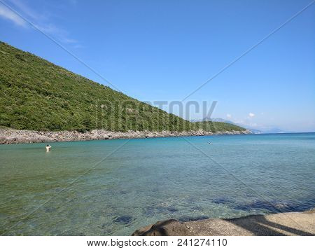 View Of The Coast Of Montenegro.  Turquoise Sea Water On The Ploce Beach.