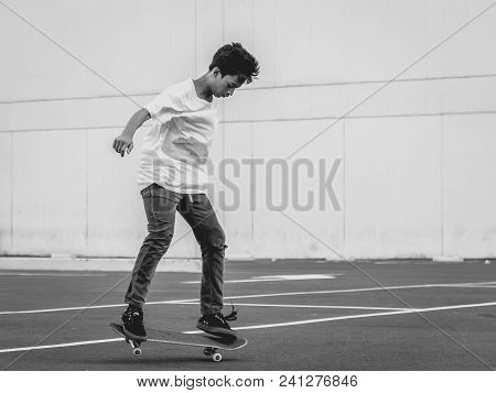 Bonifacio Global City, Taguig City, April 2, 2015: Skater Practicing In A Parking Lot In Bonifacio G