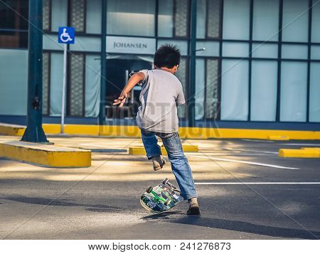 Bonifacio Global City, Taguig City, April 2, 2015: Skater Practicing In A Parking Lot In Bonifacio G
