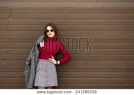 Autumn Sunny Lifestyle Fashion Portrait Of Young Stylish Hipster Woman Walking On The Street
