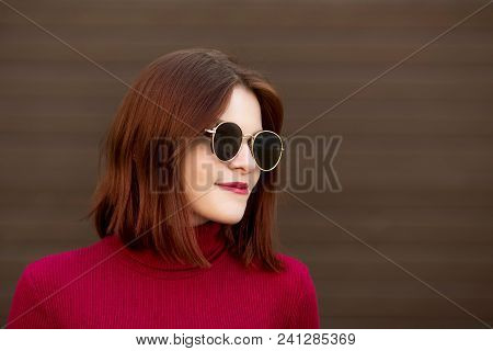 Autumn Sunny Lifestyle Fashion Portrait Of Young Stylish Hipster Woman Walking On The Street