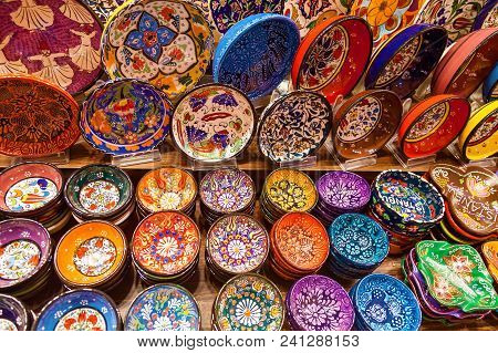 Variety Of Colorful Ceramic Plates Sold In The Grand Bazaar Market In Istanbul, Turkey