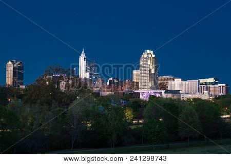 Raleigh, Nc - April 17, 2018: Raleigh, North Carolina Night Skyline From Dorothea Dix Park
