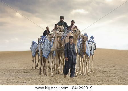 Al Madina, United Arab Emirates, 22nd July 2017: Men With Their Camels In Rub Al Khali Desert
