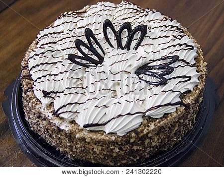 Pictured In The Photo Chocolate Cake And Cream White
