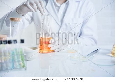 Beauty Background, Scientist Is Sampling A Chemical Extract From Organic Natural, Research And Devel
