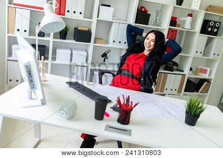 Portrait Of A Young Girl In A Suit. Beautiful Girl Is Working In The Office.