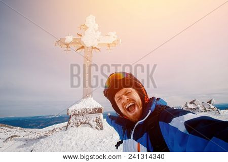 Selfie Guy Sportsman Goes On Normal Skiing On Ski Slope With Action Camera. Sheregesh Background Cro