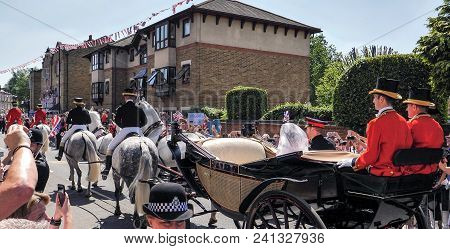 Windsor, England - May 19 2018: Prince Harry, Duke Of Sussex And Meghan, Duchess Of Sussex Leave Win