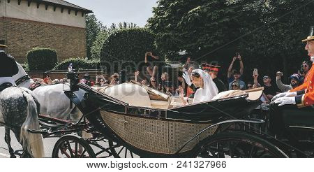Windsor, England - May 19 2018: Prince Harry, Duke Of Sussex And Meghan, Duchess Of Sussex Leave Win