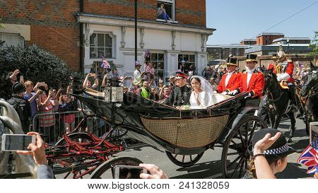 Windsor, England - May 19 2018: Prince Harry, Duke Of Sussex And Meghan, Duchess Of Sussex Leave Win