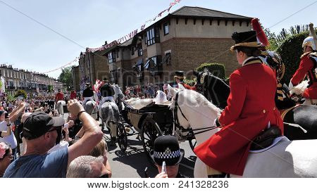 Windsor, England - May 19 2018: Prince Harry, Duke Of Sussex And Meghan, Duchess Of Sussex Leave Win