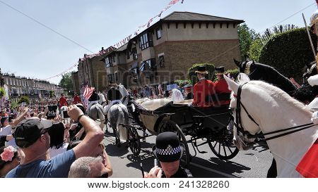 Windsor, England - May 19 2018: Prince Harry, Duke Of Sussex And Meghan, Duchess Of Sussex Leave Win