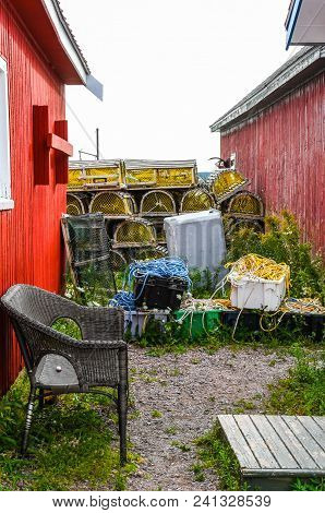 Contrasting Red Fishing Shack, New And Old, In A Village Near Rustico, Prince Edward Island Canada.
