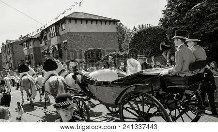 Windsor, England - May 19 2018: Prince Harry, Duke Of Sussex And Meghan, Duchess Of Sussex Leave Win