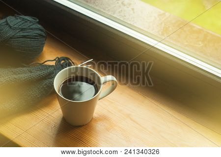 Cup Of Coffee And Knitting On Windowsill, Cozy Morning, Toned Photo