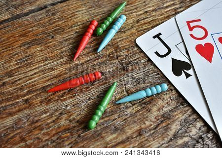 A Close Up Image Of A Winning Card Hand In A Game Of Cribbage.