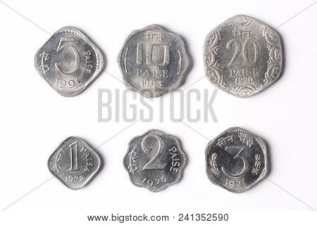 Old Indian Coins - Paise On A White Background