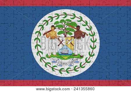 Belize Flag  Is Depicted On A Folded Puzzle