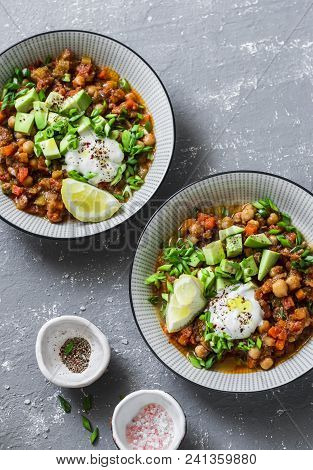Serving Lunch Vegetarian Buffalo Chickpea Chili With Mushrooms  On A Gray Background, Top View. Heal
