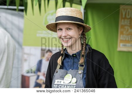 Young Beautiful Model Show Girl In Straw Hat Smiling At The Streetwalk Of The Street Food Festival I