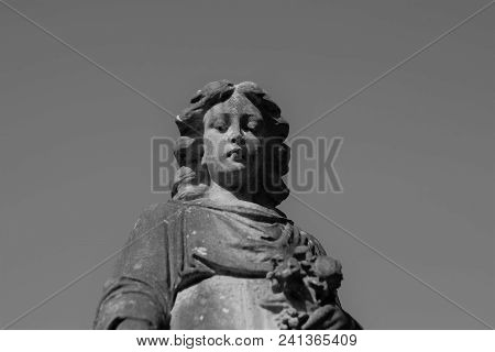 Picture Of A Statue In A Graveyard Black And White