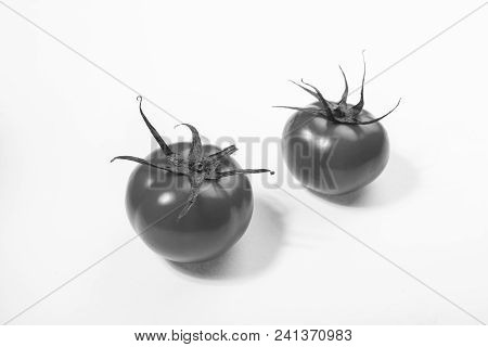 Black And White. Close-up View Of Fresh Tomato Isolated On White Background. Copy Space