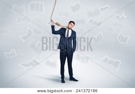 Young burnout businessman with flying documents concept