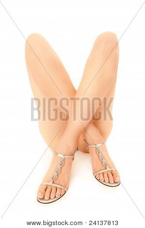 Gambe della bella donna nuda In tacchi alti