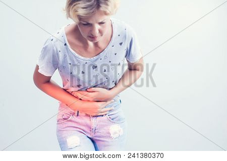 Stomach Pain Or Menstrual Pain. Woman With Pains In Abdomen. Female Belly And Hands Close Up.