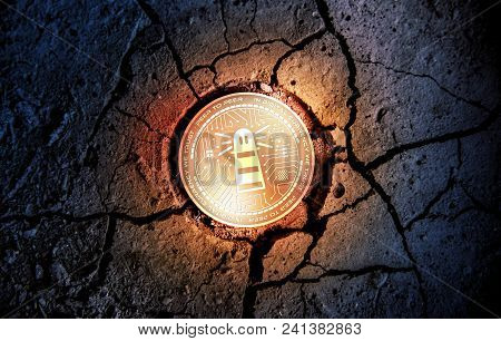 Shiny Golden Trackr Cryptocurrency Coin On Dry Earth Dessert Background Mining Crash Photo Compositi