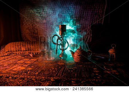 Hookah Hot Coals On Shisha Bowl Making Clouds Of Steam At Arabian Interior. Oriental Ornament On The
