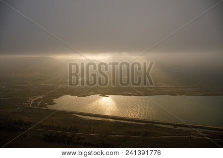 Beautiful Clouds Flying Over The Lake Near Mountains. Evening Time Shot Over The Clouds. Baku, Azerb