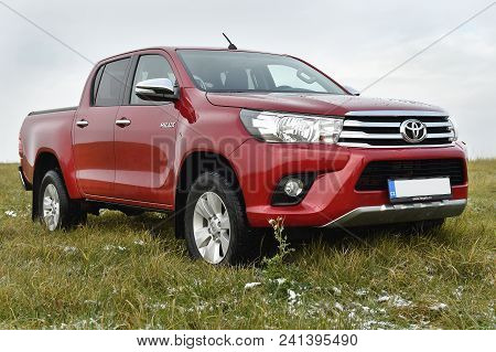 Slany, Czech Republic - November 10, 2016: Red Toyota Hilux In Slany, Czech Republic, November 10, 2
