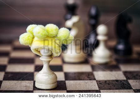 Chess Pawn In Foolish Hat - Business Failure Concept If Works Alone Without Team And Opposes Itself 