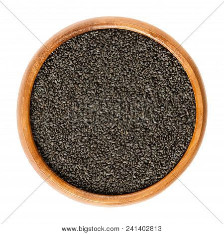 Dried Basil Seeds In Wooden Bowl. Also Great Basil. Ocimum Basilicum. Soaked Seeds Became Gelatinous