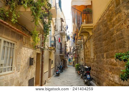 Bari, Italy - 5.05.2018: View Of A Narrow Sunny Street In The City Bari, Italy