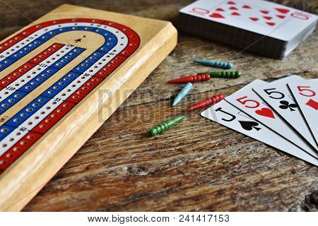 A Close Up Image Of A Winning Card Hand In A Game Of Cribbage.